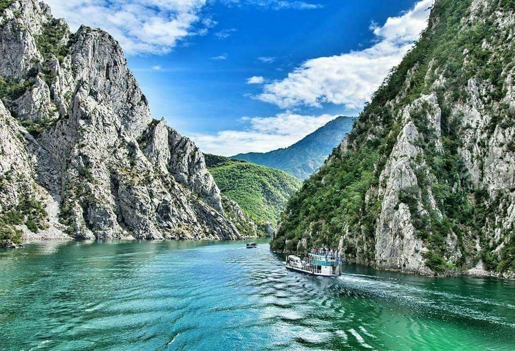 Book your trip  Komani Lake- Valbona-Theth logo